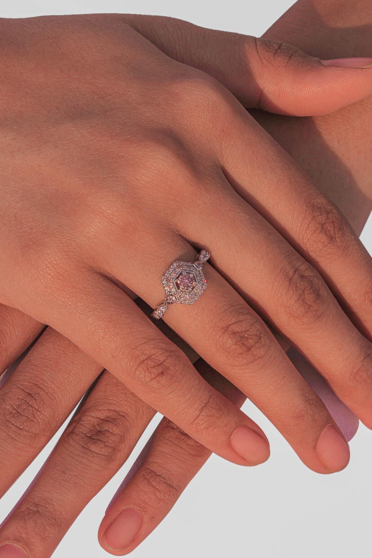 Detailed view of an Intricate Pavé Ring for women, showcasing a 3mm center gem and shimmering 2mm and 1.75mm side stones