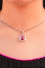 model wearing Pink Floral Cluster Pendant with Rhodium Plating