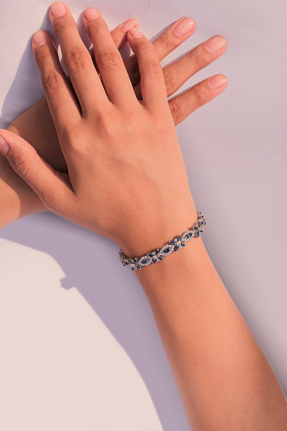 Blue Midnight Matrix Bracelet in a model hand