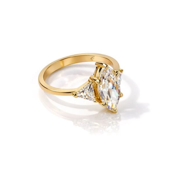 top side view of 3 Carat Marquise Trio Ring with Side Trillion Stones in gold finish